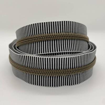 Reißverschluss Brownie-Stripes, breit, schwarz-weiß / messingfarbene Spirale