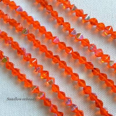 40 Bicone orange AB, Doppelkegel, Druckperlen