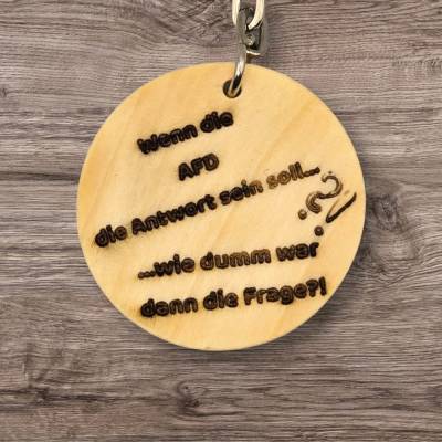 Verspielter Holz-Anhänger mit frechem Spruch