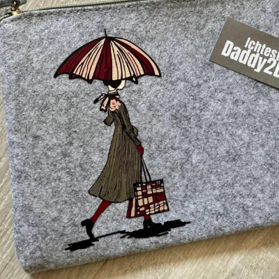 Elegante 50er Jahre Dame mit Schirm