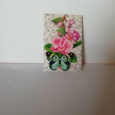 Geldgeschenktäschchen zum Geburtstag für eine Frau mit rosafarbenen Blumen