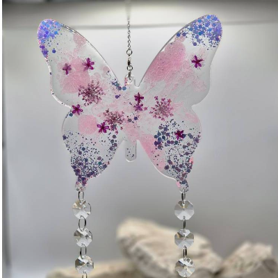 Sonnenfänger Schmetterling mit Blüten Rosa