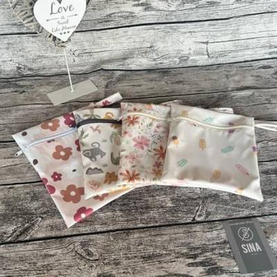 Zauberhafte Wetbags- Wechselsachen-nasse Schwimmsachen-hält Gerüche und Nässe zuverlässig im Beutel dank PUL-Beschichtun