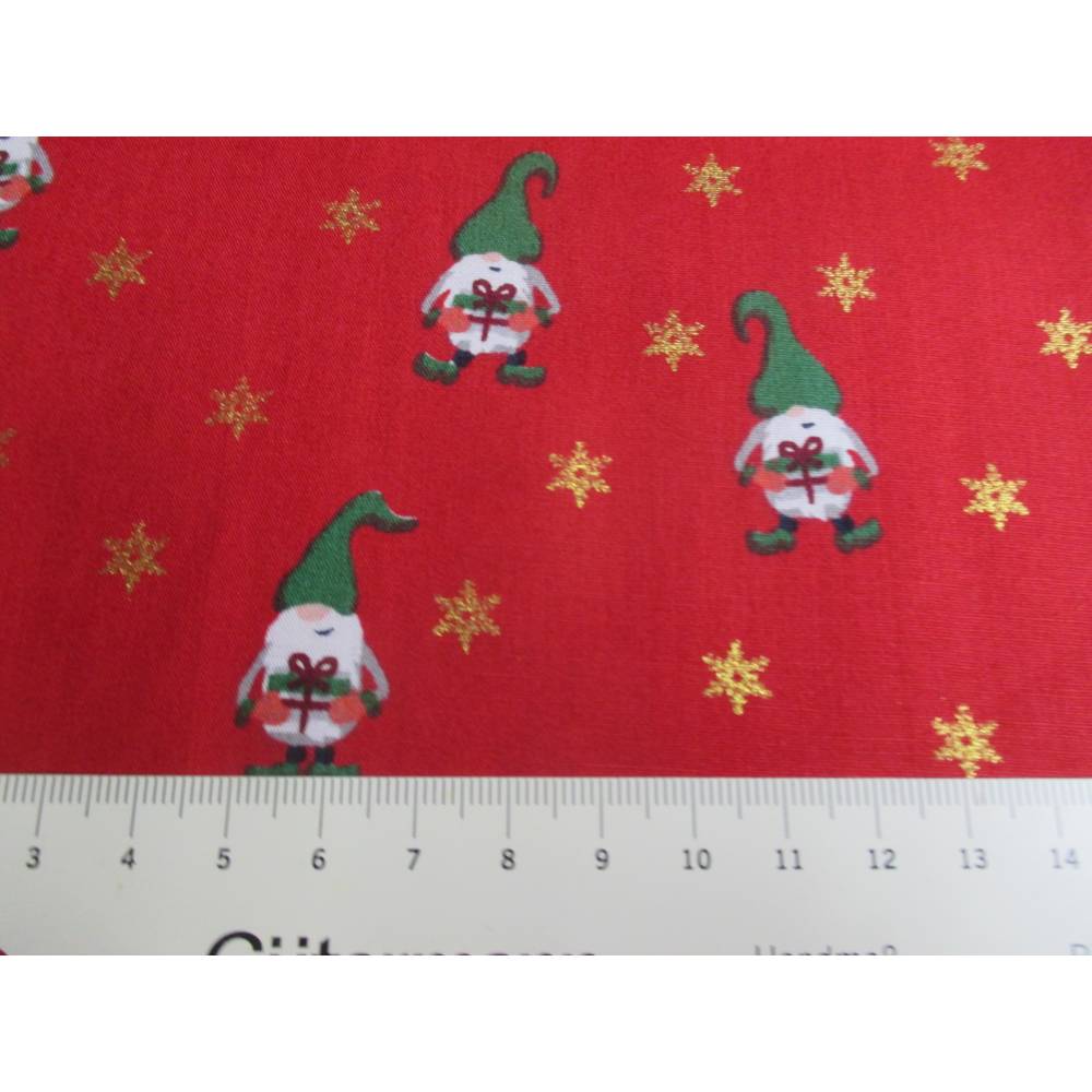Weihnachtsstoff Baumwolle Wichtel rot gold (1m/10,-€)