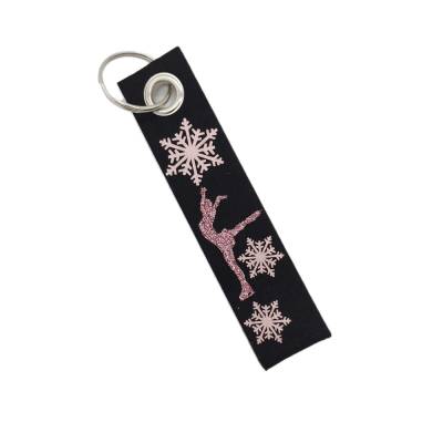Schlüsselanhänger Eiskunstlauf Schneeflocken rosa