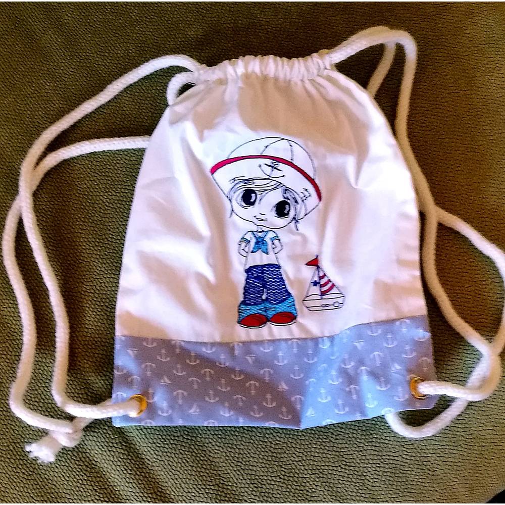 kleiner dekorativer Kinderturnbeutel aus Baumwolle mit Seemann Bild 1