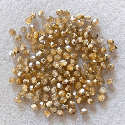 100 Glasschliffperlen 4 mm, kristall halbgold