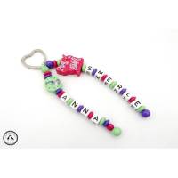 Taschenbaumler/Schlüsselanhänger mit Namen - Einhorn/Katze in lila/mint/pink Bild 1