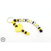 Taschenbaumler/Schlüsselanhänger mit Wunschname - Herz in gelb/schwarz Bild 1