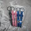 Schlüsselanhänger aus weichem Kunstleder mit Schiebeperle, verschiedene Modelle zur Wahl Bild 2