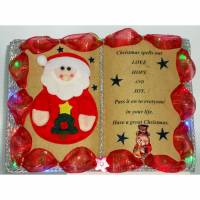 Lustiges, handgefertigtes Weihnachts-Dekobuch mit Beleuchtung und Holz-Buchständer Bild 1