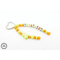 Taschenbaumler/Schlüsselanhänger mit Wunschname -Dino in lemon/orange - Bild 1