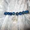 Edelstein-Armband aus Lapis-Lazuli-Perlen mit Kleeblatt-Charm aus 999 Silber Bild 2