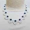 Maritime Halskette - handgefertigt aus weissen Rocailles und blauen Rundperlen Bild 2