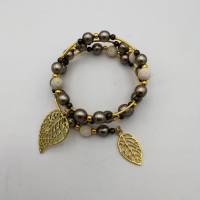 Spiralförmiger Perlen - Armreifen in creme, gold, taupe, ca. 6,5cm Durchmesser, passt sich an. Bild 2