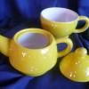Süße gelbe Teekanne mit Tasse für 2 Tassen Tee Bild 2