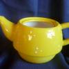 Süße gelbe Teekanne mit Tasse für 2 Tassen Tee Bild 4