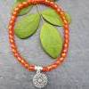 Perlenarmband orange/rot mit Mandala-Anhänger aus 925 Silber Bild 3