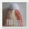 Kleine Mütze für das neugeborene Baby in orange/gelb/rot mit Bommel Bild 2