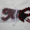 Perlenset handgefädelt aus schwarzen und roten Wachsperlen in türkischer Häkeltechnik Bild 8