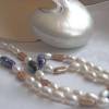 Elegante Perlenkette aus echten Perlen, festlich glänzend Bild 2