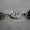 Perlenset aus türkis-blau-grün schimmernden Kristallen in Schlauchtechnik Bild 9