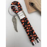 Schlüsselanhänger aus Segelseil/Segeltau, Zwischenstück "BORN TO RIDE", schwarz/orange, versilberter Adlerflügel/Schwinge am Schlüsselring Bild 1