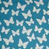 9,80 EUR/m Stoff Baumwolle Schmetterlinge weiß auf türkis / dunkeltürkis Bild 2