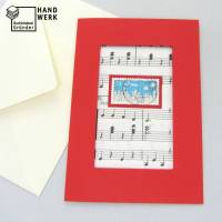 Weihnachtskarte Briefmarke, Noten, Winter, hellrote Klappkarte mit Umschlag Bild 1
