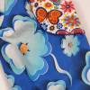 Mitwachsende Pumphose in Gr. 86 aus Jersey in Blau mit Blumen mit und aufgesetzten Taschen mit Blüten Bild 2