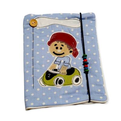 eine süße Windeltasche mit einem "Kind im Auto" Motiv zur Aufbewahrung und Transport unterschiedlicher Gegenstän