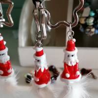 Halskette mit Glas-Weihnachtsmann und dicker Schnellflocke aus Fell Bild 1