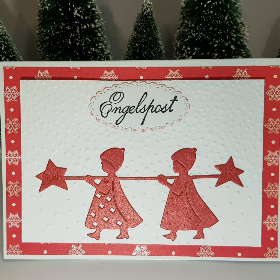 Rote Engel bringen die Weihnachts-Karte mit Weihnachts-Grüßen Handmade