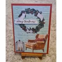 Weihnachtskarte mit Weihnachtskranz , Laterne , Sessel Bild 1