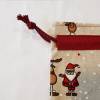 Weihnachten unverpackt – festliche Geschenkpapieralternative aus Stoff mit Weihnachtsmann und Elch Bild 2