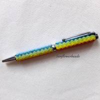 Drehkugelschreiber silber, mit Miyuki Delica Perlen in Regenbogenfarben umfädelt Bild 1