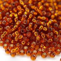 Toho Seed Beads 11/0 Silver-Lined Burnt Orange Bild 1