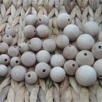 Holzperlen Holzkugeln natur roh 15 20 25 mm mit Bohrung Bild 3