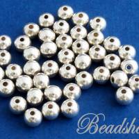 40 Metallperlen 5 mm Perlen silberfarben Spacer Bild 1