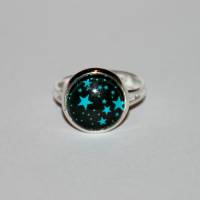 1 silberfarbener Ring   schwarz mit türkisenen Sternen Bild 1
