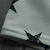 Kinderrock aus French Terry mit Sternen wollweiß schwarz Größe 110 Bild 3