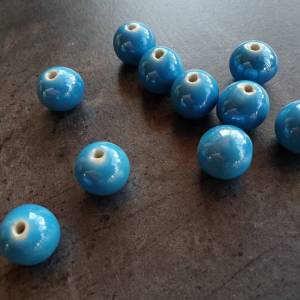 DRAHTORIA 10 x Perlen aus Keramik blau himmelblau jede ein Unikat 16 mm rund Kugel gebohrt Bild 1
