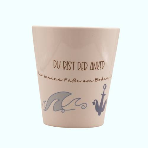 dekorativ gestaltete weiße Kaffee-Tasse mit Spruch zum Thema Meer, kreativer Spruch auf dem Kaffee-Becher