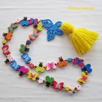Kinderkette bunt Bettelkette Hippie Ibiza Holzperlen Blumen Schmetterling Marienkäfer Kette Holzkette Quaste Anhänger Bild 1