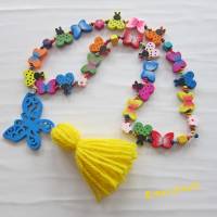 Kinderkette bunt Bettelkette Hippie Ibiza Holzperlen Blumen Schmetterling Marienkäfer Kette Holzkette Quaste Anhänger Bild 3