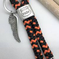 Schlüsselanhänger aus Segelseil/Segeltau, Zwischenstück "BORN TO RIDE", schwarz/orange, versilberter Adlerflügel/Schwinge am Schlüsselring Bild 1