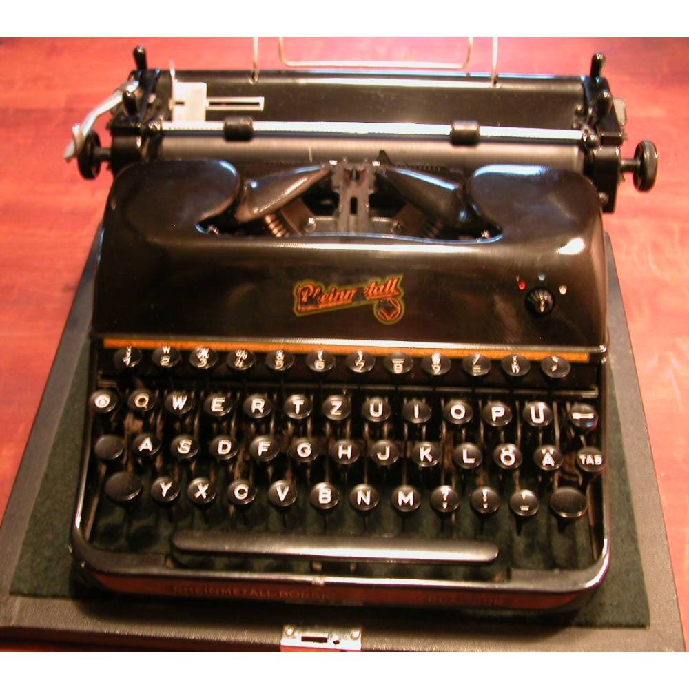 Rheinmetall Klein-Schreibmaschine mit HO Rechnung vom 27.Nov. 1953 Bild 1