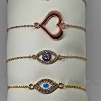 Zartes, filigranes, minimalistisches  goldfarbenes Edelstahl Armband mit türkischem Auge mit blauen Glassteinchen Bild 5