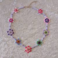 fröhliche Blumenkette in rosa-flieder Bild 1