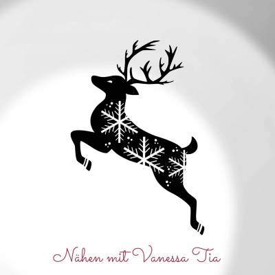 Rentier mit Schneeflocke